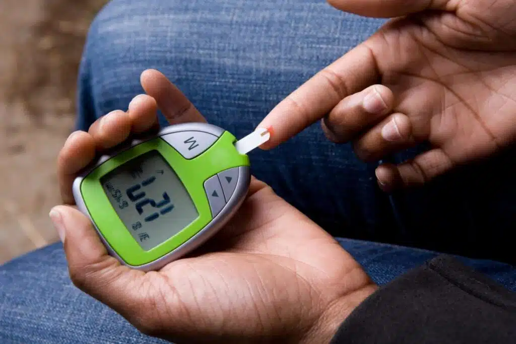 picture of woman checking her blood sugar