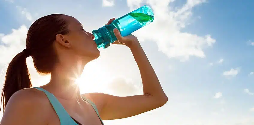 aim to double your normal water intake when exercising in hot water